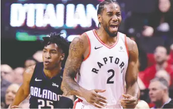  ?? FRaNK GUNN/THE CANADIAN PRESS ?? Forward Kawhi Leonard shows his emotions during Toronto’s Game 5 victory over the Orlando Magic. Leonard was a devastatin­g offensive force for the Raptors throughout the series.