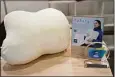  ?? ?? The fufuly robotic cushion is on display during the CES tech show Thursday.