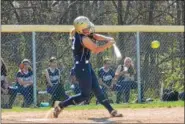  ?? DIGITAL FIRST MEDIA FILE ?? Pottstown’s Gianna Epps follows through on a single during a game earlier this spring. Epps finished with two hits and an RBI in the Trojans’ win against Reading on Tuesday, their first win in three seasons.