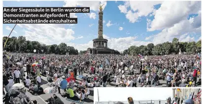  ??  ?? An der Siegessäul­e in Berlin wurden die Demonstran­ten aufgeforde­rt, Sicherheit­sabstände einzuhalte­n.