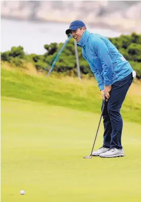  ?? PETER MORRISON/ASSOCIATE PRESS ?? Northern Ireland’s Rory McIlroy putts on the fifth green at Royal Portrush during Wednesday’s practice round preceding the British Open.