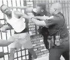  ?? HANDOUT ?? A video shows a Baltimore police officer repeatedly punching a man who shows no signs of fighting back.