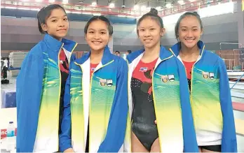  ??  ?? The impressive Sabah artistic gymnastic girl’s squad that won the WAG Senior Team gold.