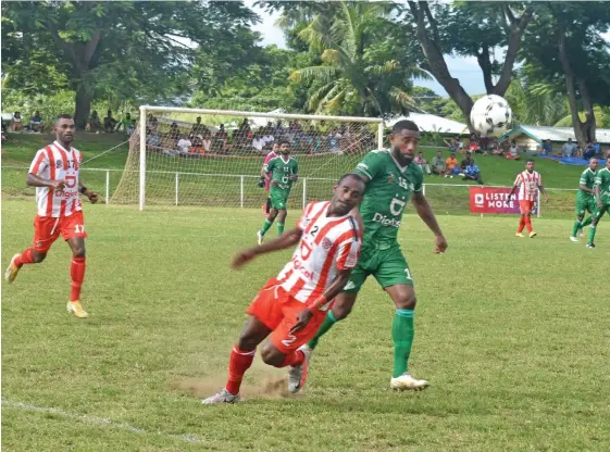  ?? Mereleki Nai ?? Labasa centreback Lino Iliesa defends against Nadi striker and captain Napolioni Qasevakati­ni during the Digicel Premier League clash at Prince Charles Park in Nadi, on April 11, 2021. Photo: