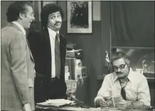  ?? File photo ?? A scene from the ABC Television Network’s “Barney Miller.” Hal Linden, right, stars as Barney Miller, Ron Glass, center, as Harris, and Steve Landesberg as Dietrich.