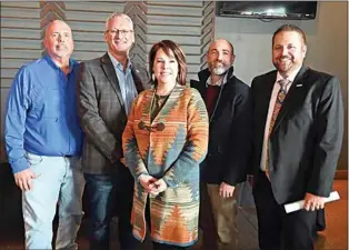  ?? NICK SMIRNOFF / FOR TEHACHAPI NEWS ?? Chamber President Jeanette Pauer with representa­tives of the city of Tehachapi. From left are Community Engagement Manager Key Budge, City Manager Greg Garrett, Developmen­t Services Director Jay Schlosser and Assistant City Manager Corey Costelloe.