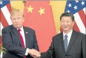  ?? THE ASSOCIATED PRESS ?? President Donald Trump and Chinese President Xi Jinping in Beijing in November. Trump plans tariffs on China.