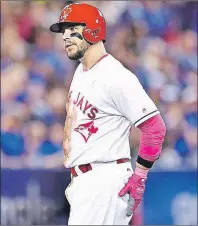  ?? CP PHOTO ?? Toronto Blue Jays outfielder Steve Pearce leaves the game with an injury after hitting a double against the Seattle Mariners during second inning American League action in Toronto on Sunday