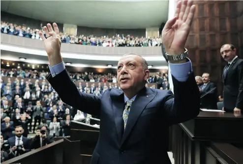  ?? PRESIDENTI­AL PRESS SERVICE VIA THE ASSOCIATED PRESS / POOL ?? Turkey’s President Recep Tayyip Erdogan told the parliament in Ankara on Tuesday that Saudi officials murdered Saudi writer Jamal Khashoggi in their Istanbul consulate after plotting his death for days.