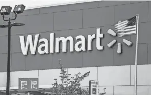  ?? TIMOTHY FADEK/BLOOMBERG FILE PHOTO ?? Walmart has opened 20 health centers in four states, including Illinois in the Midwest.