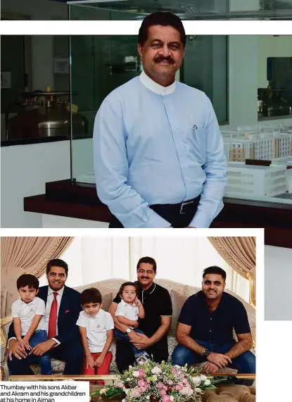  ??  ?? Thumbay with his sons Akbar and Akram and his grandchild­ren at his home in Ajman