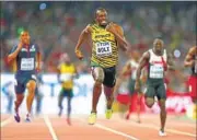  ??  ?? Usain Bolt completed the treble at 2015 World Championsh­ips. GETTY