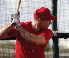  ?? AP ?? EYE ON THE BALL: The St. Louis Cardinals' Paul Goldschmid­t, a disappoint­ing trade acquisitio­n last year, takes his turn in the batting cage on Feb. 12.