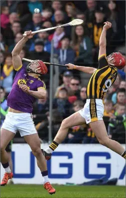  ??  ?? Lee Chin controls the ball with Cillian Buckley (Kilkenny) close at hand.