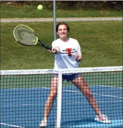  ?? PILOT PHOTO/RON HARAMIA ?? Megan Kobelt gets a volley at the net during a recent Glenn tennis practice.