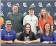  ?? Scott Herpst ?? Michael and Kelly Boyd were among those on hand to watch Gordon Lee senior Ashlyn Boyd (seated, center) sign on to continue her volleyball career at nearby Chattanoog­a State last Monday. Also in attendance were Gordon Lee volleyball head coach Adam Crowley, Christian Boyd and Coach Tori Malone of Anthem United Volleyball Club.