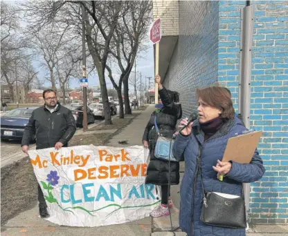  ?? EMMANUEL CAMARILLO/SUN-TIMES ?? Theresa Reyes urged the next mayor of Chicago to clean up the air on the Southwest Side at a rally Thursday outside the MAT Asphalt facility at 2055 W. Pershing Road.