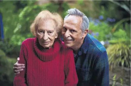  ?? PHOTO: CHRISTOPHE­R THOMOND/THE GUARDIAN ?? ▲ Simon Hattenston­e with his late mother, Marje. He had started a payroll in 2022 for her two carers