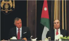  ?? AFP ?? King Abdullah II, left, with Prime Minister Hani Mulki last month, yesterday accepted Mr Mulki’s resignatio­n