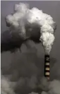  ?? THE ASSOCIATED PRESS FILES ?? Smoke from coal plants is a source of greenhouse gas.