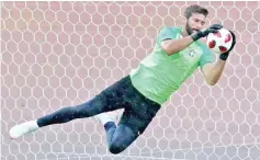  ??  ?? Brazil’s Alisson during training. — Reuters photo