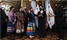  ??  ?? Deb Haaland, center, with Kamala Harris, right, during Haaland’s swearing-in for interior secretary in Washington DC on 18 March. Photograph: Alex Brandon/AP