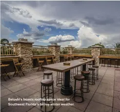  ??  ?? Belushi’s boasts rooftop space ideal for Southwest Florida’s balmy winter weather.