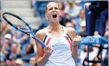  ?? Jason Decrow / The Associated Press ?? Karolina Pliskova celebrates after defeating Zhang Shuai in the third round of the U.S. Open on Saturday in New York.