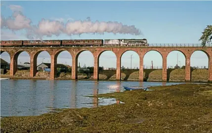  ?? ?? Departing Montrose, Blue Peter heads south with a Scottish Railway Preservati­on Society tour from Stirling to Aberdeen on August 8, 1994. JOHN TITLOW