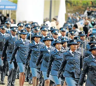  ?? /Vathiswa Ruselo ?? On parade: Police officers on the march at the Union Buildings. The parliament­ary committee on police was shocked to hear that some officers are illiterate.