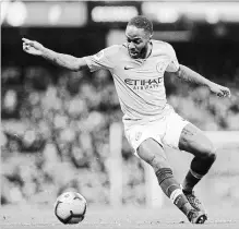  ?? ASSOCIATED PRESS FILE PHOTO ?? Manchester City's Raheem Sterling controls the ball during a match against Bournemout­h in Manchester, England, on Dec. 1.