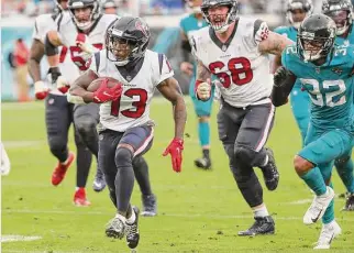  ?? Brett Coomer/Staff photograph­er ?? Wide receiver Brandin Cooks races for a 43-yard touchdown last December in Jacksonvil­le. The Texans take an eight-game winning streak against the Jaguars into Sunday’s matchup.