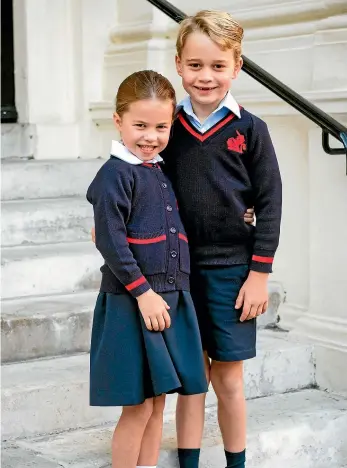  ?? AP ?? In this photo released by Kensington Palace, Princess Charlotte poses with her brother Prince George before her first day of school at Thomas’s Battersea, in London.
