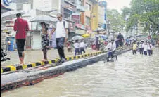  ?? PTI ?? A waterlogge­d street in Varanasi on Friday.