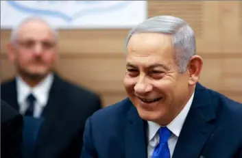  ?? Gali Tibbon/AFP/Getty Images ?? Israeli Prime Minister Benjamin Netanyahu attends a meeting at the Knesset on Monday.