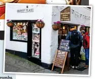  ??  ?? Clash: Bettys Tea Rooms in Harrogate, left, and Helen Matos and Mark Whittaker, right, who run a small cafe in Whitby, inset