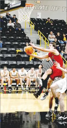  ?? ENTERPRISE-LEADER photograph by Mark Humphrey ?? Blackhawk senior Noah Peterson scores on a breakaway while drawing a foul during a conference game won by Pea Ridge, 56-39, at Tiger Arena in a reschedule­d game played Monday, Jan. 13.