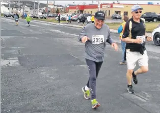  ?? SUBMITTED ?? There’s no stopping him. After heart surgery in 1998, Harry Cooze turned to running to stay in shape. Since then he’s run in internatio­nal races as far away as Turkey.