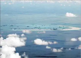  ?? Ritchie B. Tongo Pool Photo ?? MISCHIEF REEF in the disputed Spratly Islands is among the areas in the South China Sea where China has undertaken land reclamatio­n efforts.