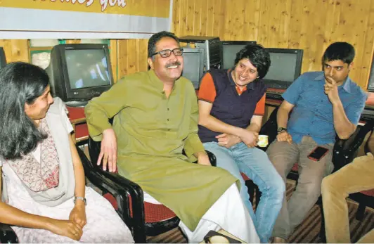  ?? NISSAR AHMAD ?? SHUJAAT BUKHARI at his “Rising Kashmir” office in Srinagar. A file photograph.