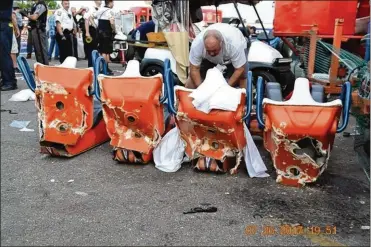  ?? OHIO HIGHWAY PATROL ?? These damaged seats were attached to the gondola arm that broke off from the Fire Ball ride at the Ohio State Fair on July 26, 2017. The ride was built in 1998.