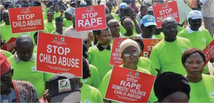  ??  ?? Walk against child abuse and rape