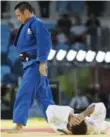  ?? RYAN REMIORZ/THE CANADIAN PRESS ?? Japan’s Masashi Ebinuma walks away after defeating Antoine Bouchard, from Jonquiere, Que.