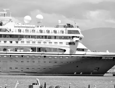  ?? KENYON HEMANS/PHOTOGRAPH­ER ?? The MS Braemar from Fred Olsen Cruise Lines docked at Port Royal, Kingston, yesterday. Jamaica’s cruise industry is under threat as the COVID-19 outbreak has raised new health-reporting hurdles for vessels.