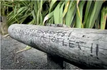  ??  ?? Hand written messages in the Queen Elizabeth II Drive carpark in Nelson attest to the animosity felt towards the freedom campers.