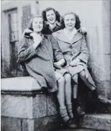  ??  ?? Here, Denise Saunders -Somers, Jean Ward and Irene Green, three of the group, sit on the steps of Delta Secondary School in 1944.