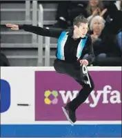  ?? Carlos Osorio Associated Press ?? JASON BROWN, performing his free skate, finished third at the U.S. figure skating championsh­ips.