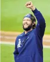  ?? USA TODAY SPORTS ?? Dodgers starting pitcher Clayton Kershaw celebrates his side’s win over the Tampa Bay Rays in game five of the World Series in Texas yesterday.