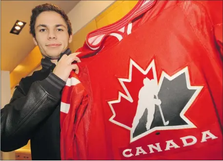  ?? Stuart Gradon/calgary Herald ?? Canada World Junior hockey team player Ty Rattie shows off his jersey at WinSport at Canada Olympic Park in Calgary on Thursday.