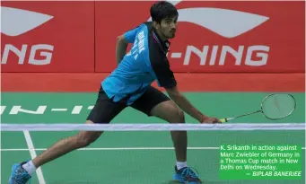  ?? — BIPLAB BANERJEE ?? K. Srikanth in action against Marc Zwiebler of Germany in a Thomas Cup match in New Delhi on Wednesday.